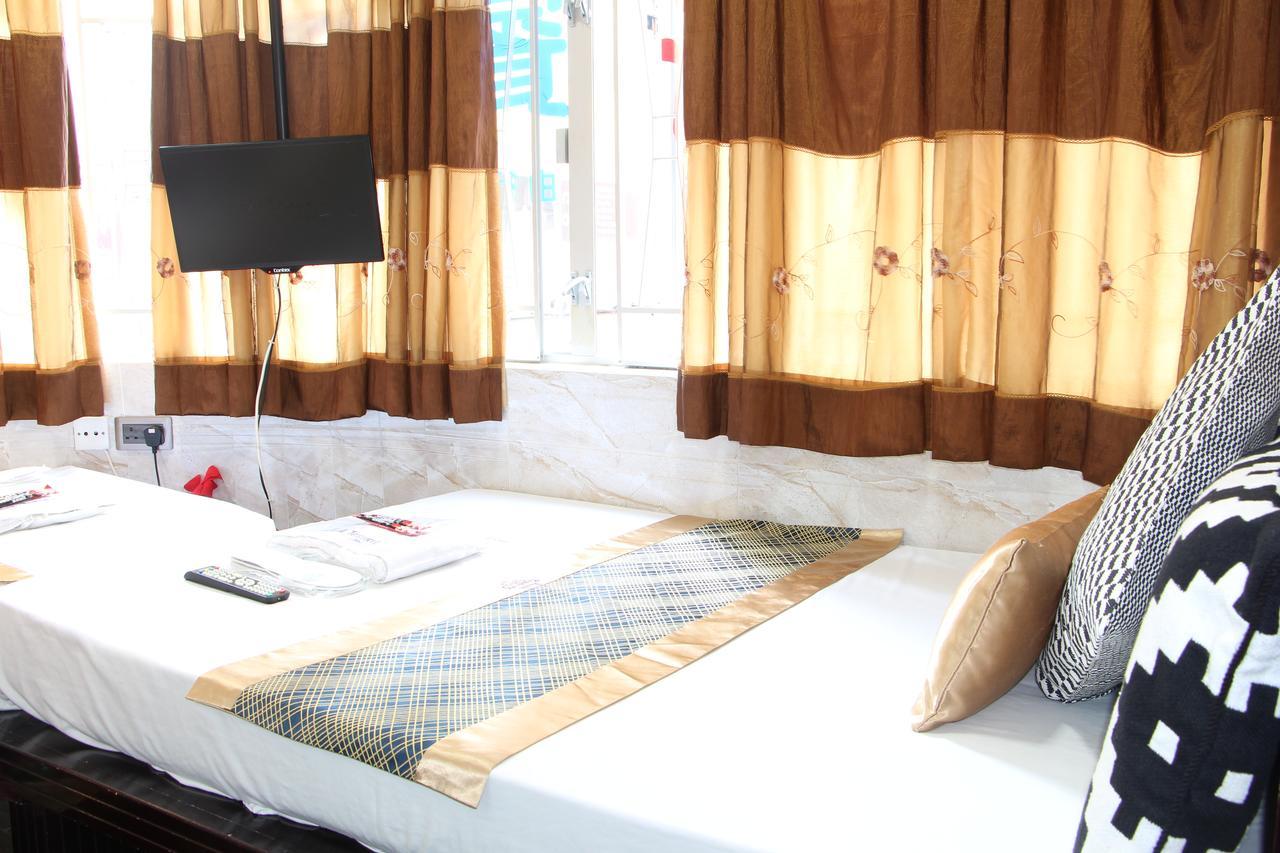 Temple Street Hotel Kaulung Kültér fotó