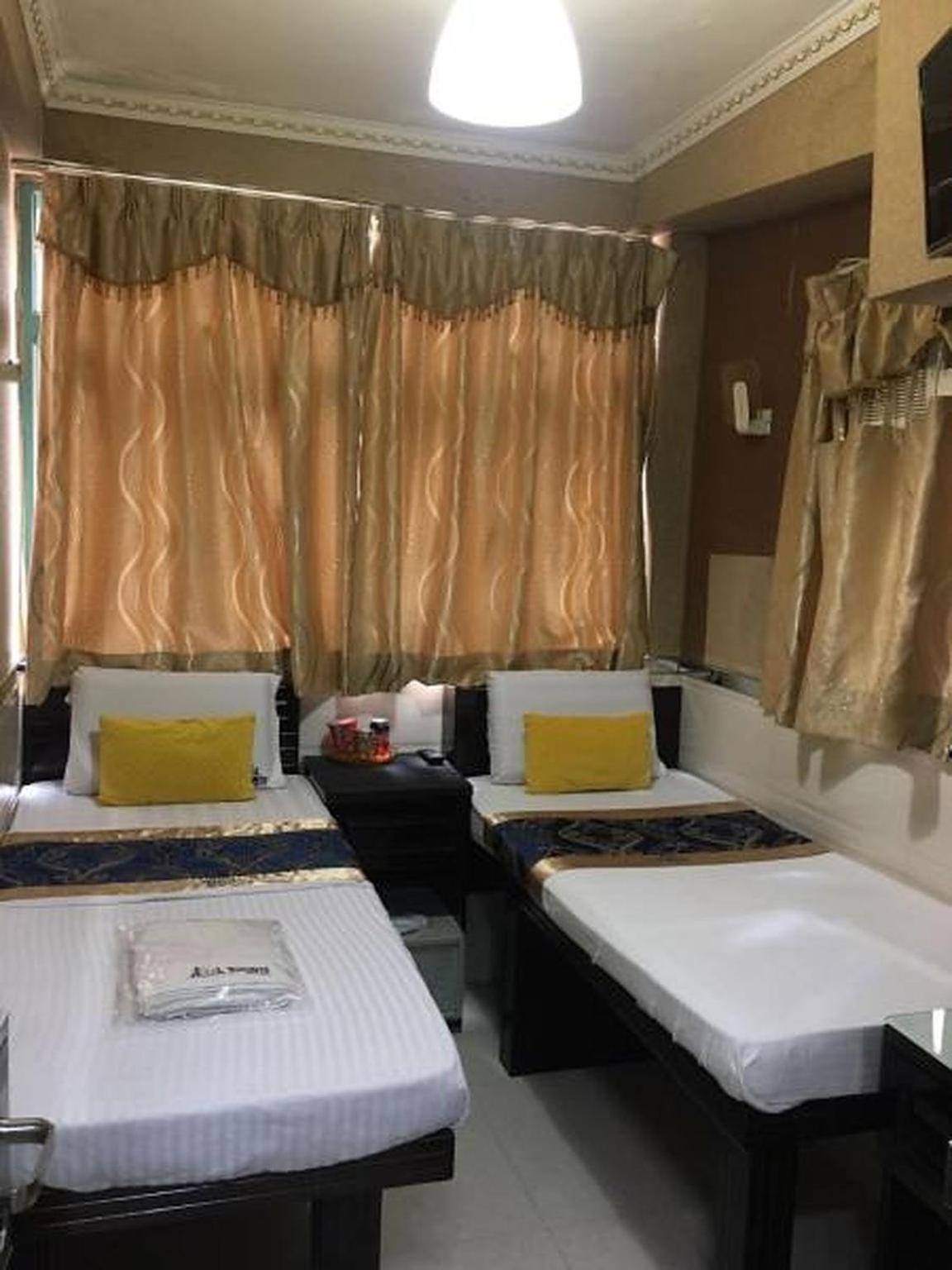 Temple Street Hotel Kaulung Kültér fotó