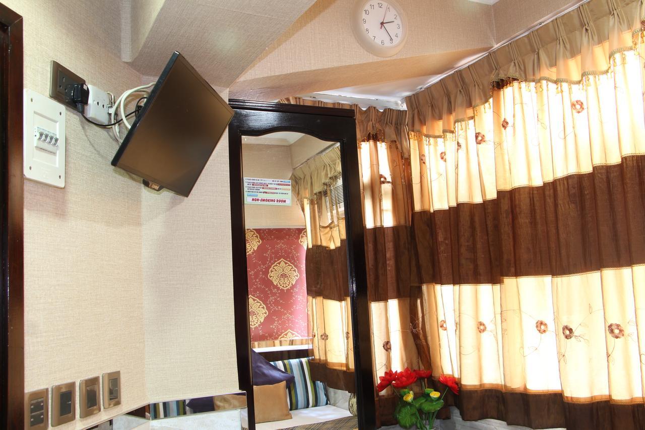 Temple Street Hotel Kaulung Kültér fotó