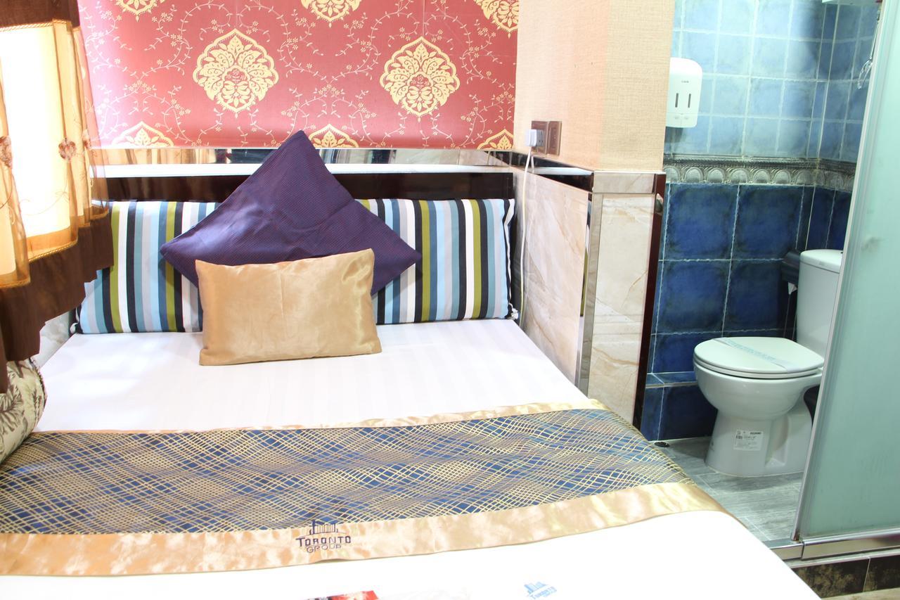 Temple Street Hotel Kaulung Kültér fotó