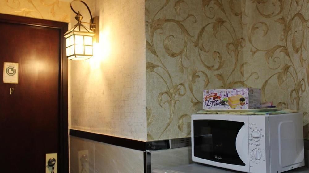 Temple Street Hotel Kaulung Kültér fotó