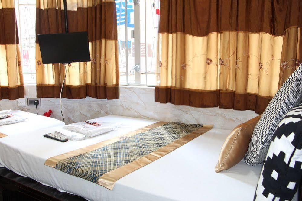 Temple Street Hotel Kaulung Kültér fotó
